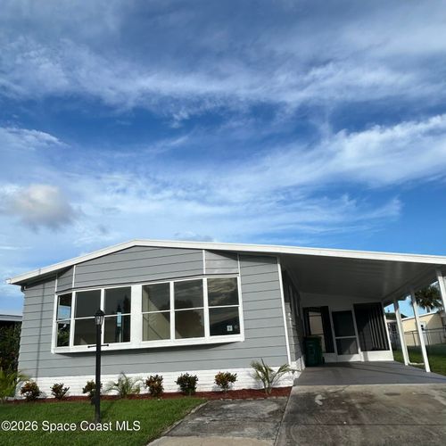 911 Hyacinth Cir, Barefoot Bay, FL, 32976-7668 | Card Image