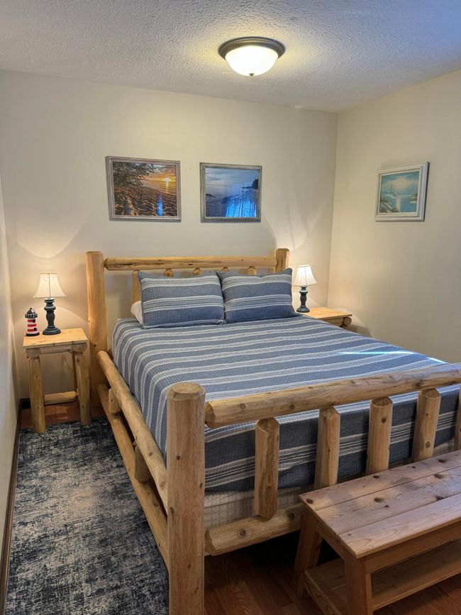 8288 Portage St, House other with 4 bedrooms, 3 bathrooms and null parking in Onekama MI | Image 15