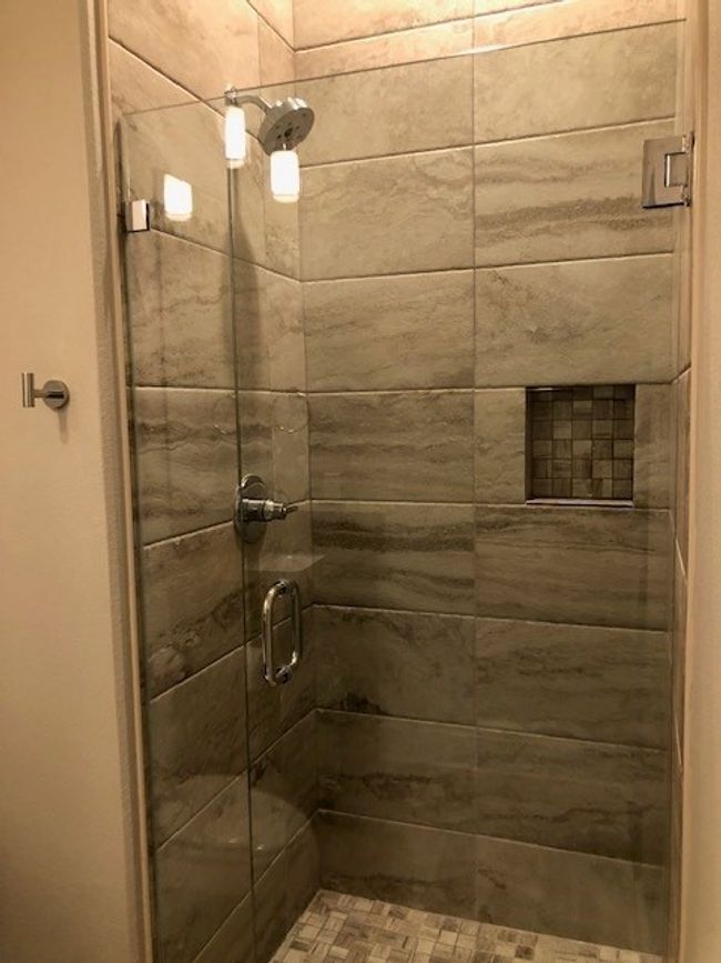 Bathroom featuring a stall shower | Image 15