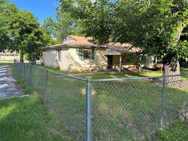 View of front of home with a fenced backyard | Image 5