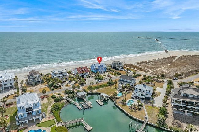 Drone / aerial view featuring a water view and a view of the beach | Image 39