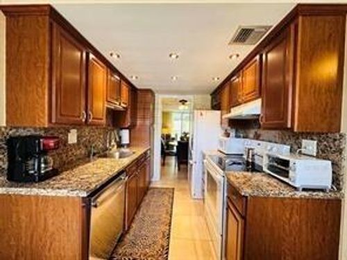 253-3099 Nw 48th Ave, Lauderdale Lakes, FL, 33313-7215 | Card Image