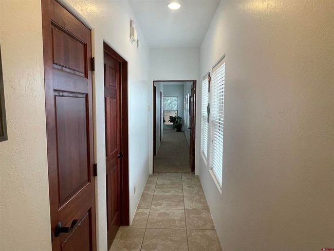 Hall going towards Primary Bedroom | Image 16