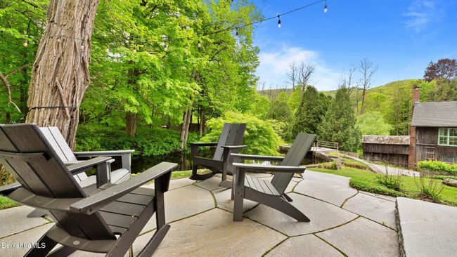 Patio overlooks Brook | Image 42