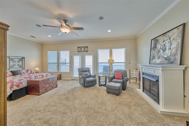 Huge Primary Bedroom w/Fireplace & Open Water Views of Lake Conroe. | Image 11
