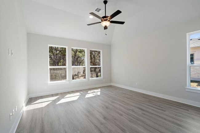 Primary Bedroom with elevated ceiling | Image 17