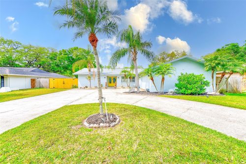 921 Woodland Dr, PALM HARBOR, FL, 34683-6658 | Card Image