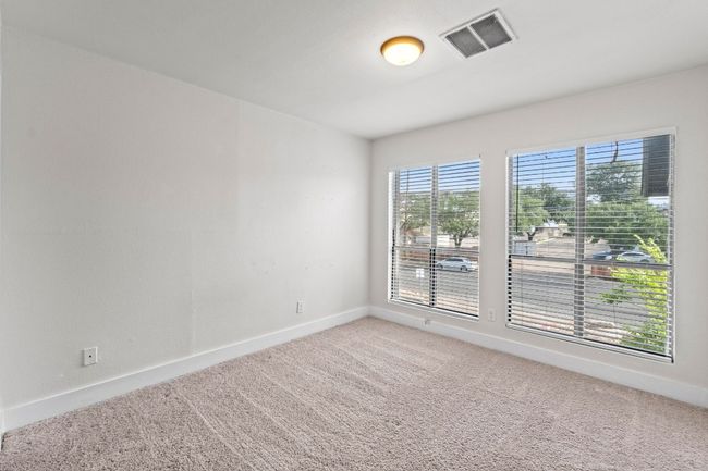 Spare room featuring carpet and baseboards | Image 33