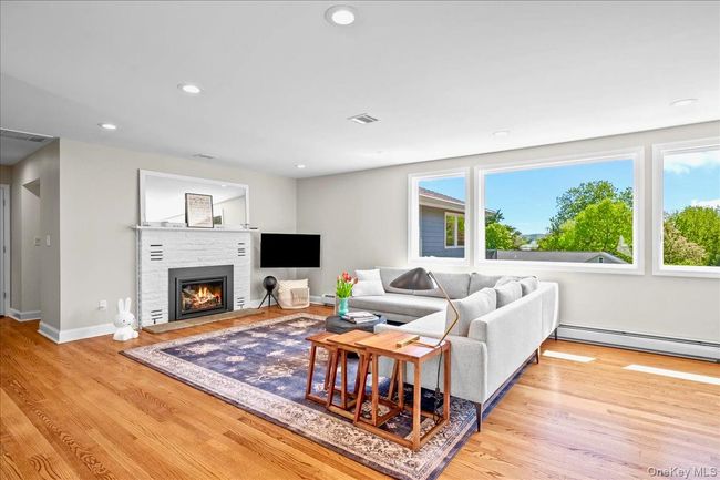 Living area with gas fireplace | Image 5
