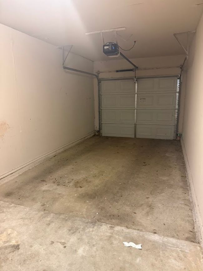 Garage featuring a garage door opener | Image 10