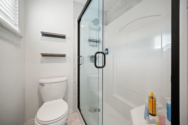 Primary Bathroom with updated bathroom and large walk in shower. | Image 14