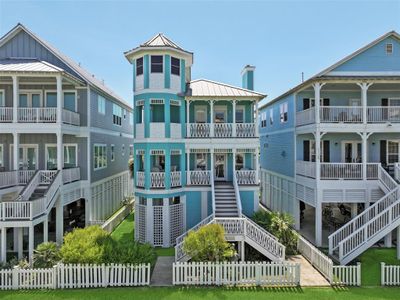 Welcome to your exquisite beachside retreat at 3819 Conch, a symphony of luxury and coastal charm. | Image 1