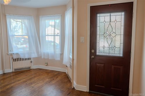 7216 66th Drive, New York, NY, 11379 | Card Image