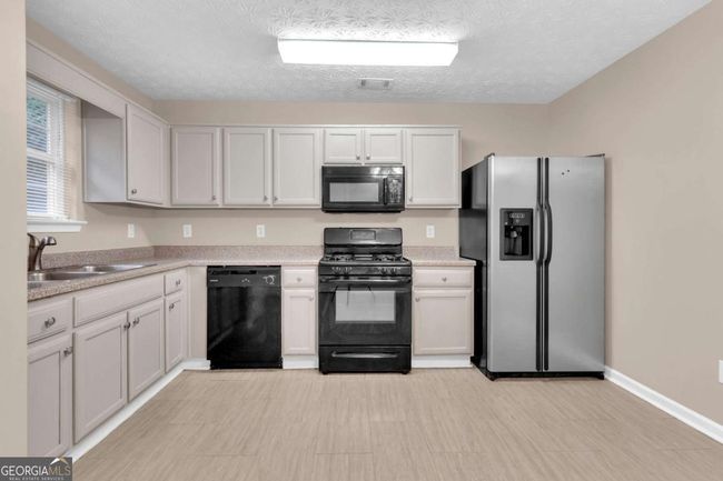 5566 Pineridge Ct, Townhouse with 3 bedrooms, 3 bathrooms and 2 parking in Forest Park GA | Image 13