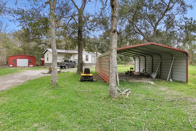 13271 Mustang Trl, House other with 2 bedrooms, 1 bathrooms and null parking in Hamshire TX | Image 22