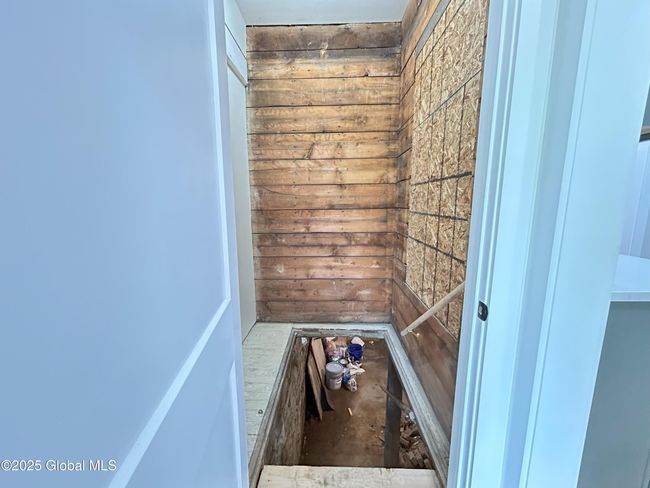 1 of 2 basement entrances This one with original shiplap is off kitchen | Image 26