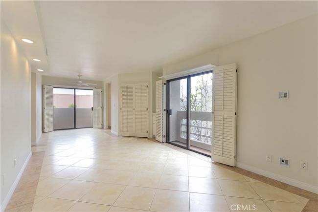 Living room and dining area showing both Juliette balconies | Image 13