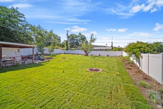 View of yard with a patio | Image 29