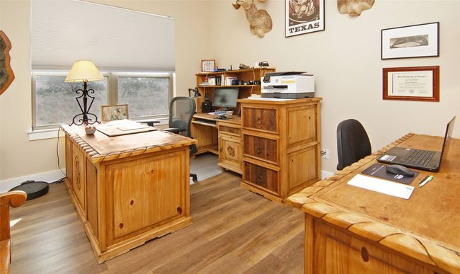 Office space with light wood-style floors and baseboards | Image 20