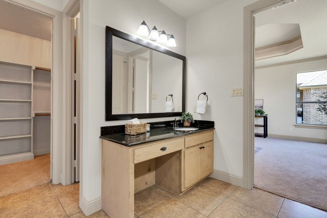 Bathroom with vanity and tile patterned flooring | Image 18