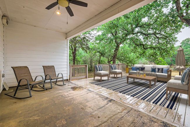 View of covered patio / terrace with an outdoor hangout area and ceiling fan | Image 21