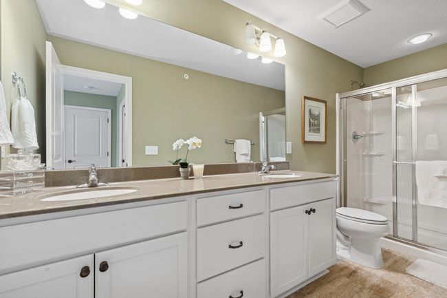 Sizeable & functional dual vanity in this private bath. | Image 15