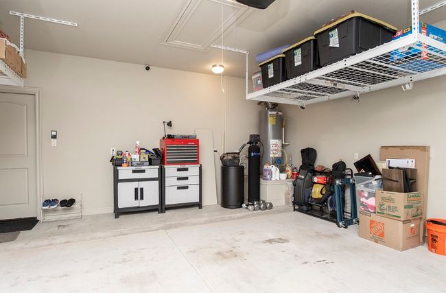 Handy ceiling storage in garage | Image 31