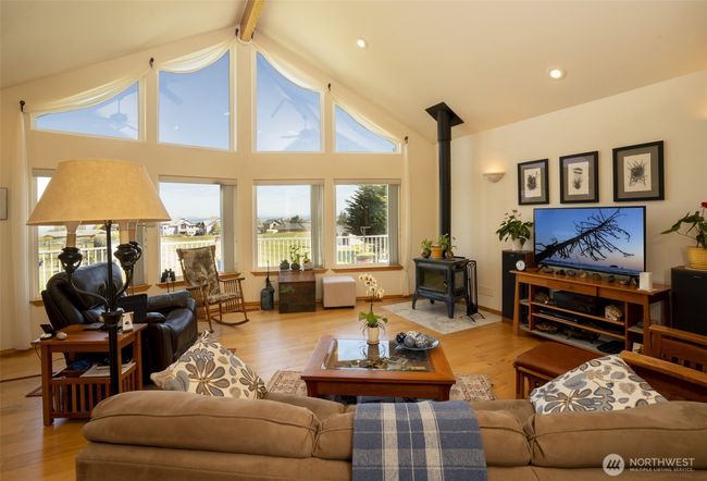 Living room with free standing wood stove | Image 10