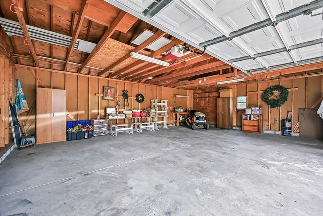 Spacious 2.5 car garage w/ ample storage | Image 32
