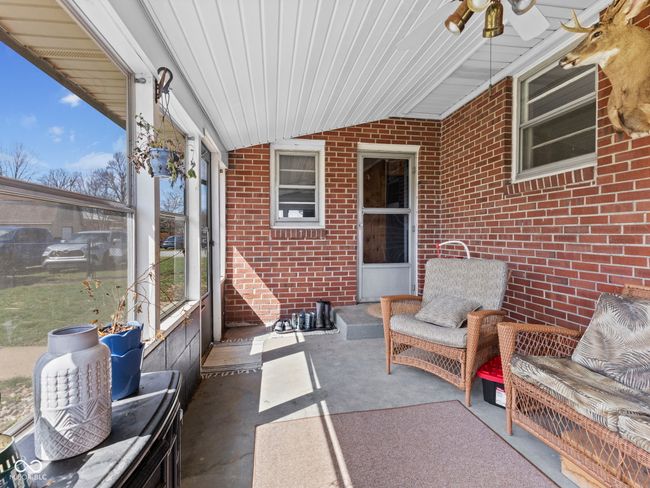 sunroom with a healthy amount of sunlight | Image 29
