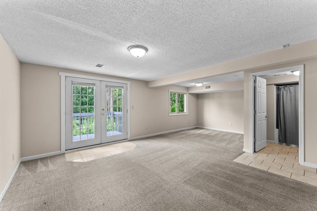 Lower level familyroom walk out to deck | Image 15