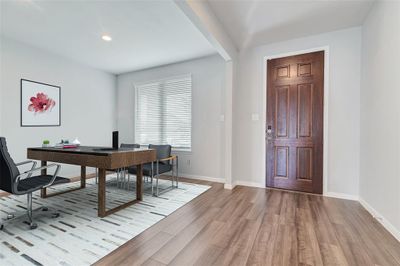 Spacious entry. This home offers vinyl plank flooring through out much of the house except carpet in the bedrooms throughout most of of the house except carpet in the bedrooms, game room and media room. Viturally staged. | Image 3