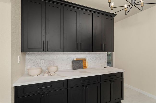 Just steps away, a scullery adds even more storage, with extra cabinetry and drawers for all your culinary essentials. | Image 17