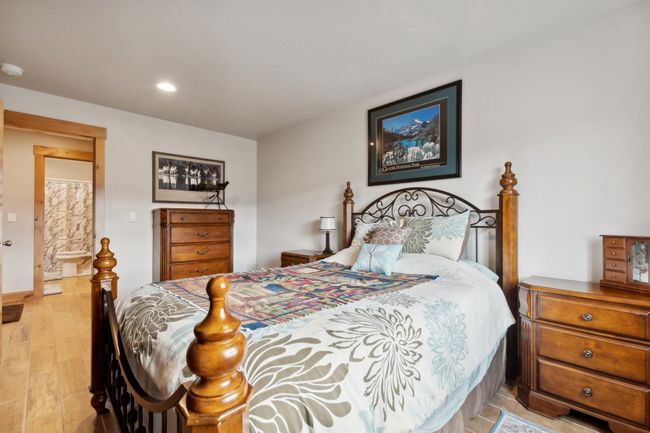 Bedroom with light hardwood / wood-style flooring | Image 45