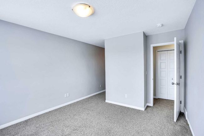 201 - 70 Saddlestone Dr Ne, Townhouse with 2 bedrooms, 3 bathrooms and 1 parking in Calgary AB | Image 7