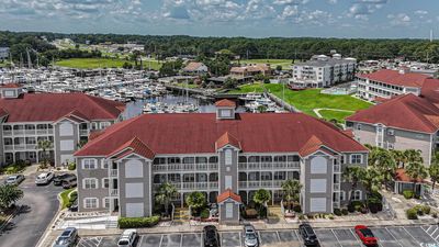 Aerial view featuring a water view | Image 2