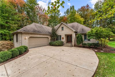 View of property with a garage | Image 3