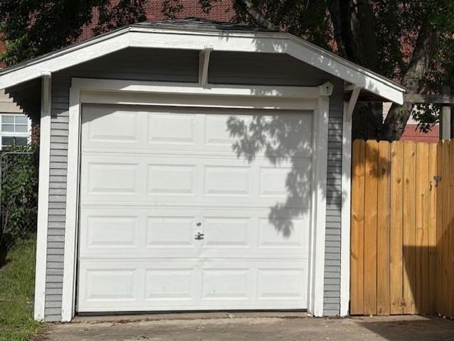 Garage featuring fence | Image 31