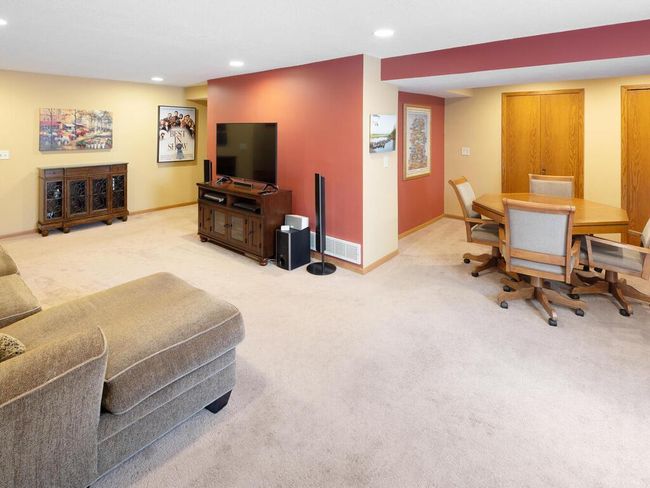 Lower level Family Room with adjacent Game room | Image 40