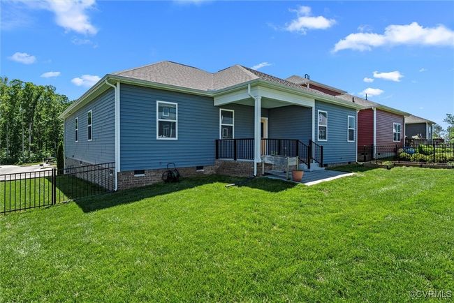 Rear view of house with crawl space | Image 46