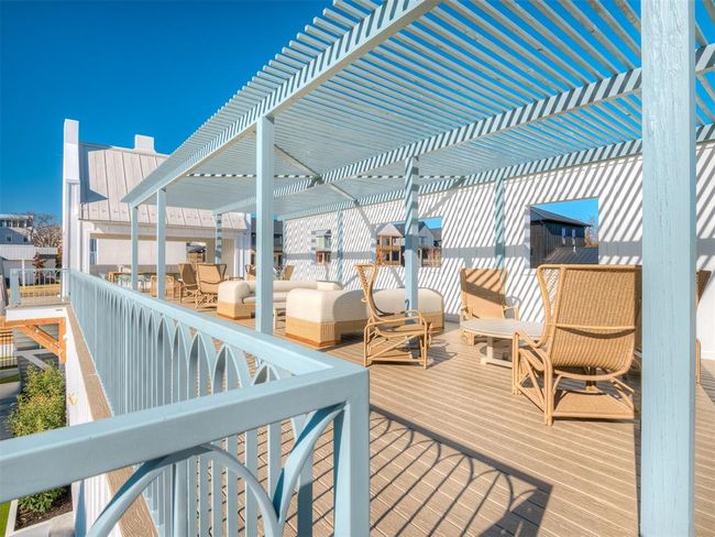 Wooden deck featuring a pergola | Image 44