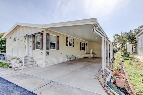 7-7 Frangipani Cir, Largo, FL, 33770-7412 | Card Image