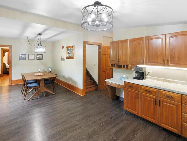 Dining and stairs going up to one of the BR's | Image 27