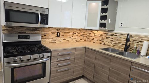 581 Meacham Ave, Elmont, NY, 11003-3803 | Card Image