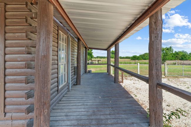 Wooden deck featuring a rural view | Image 6