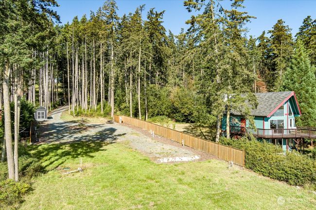 Alot of space & sunlight to enjoy with privacy fencing on each side | Image 9