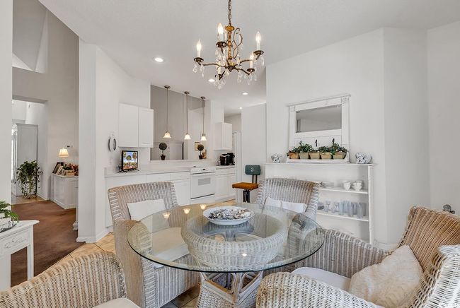 Dining space featuring a chandelier, recessed lighting, and light tile patterned floors | Image 18