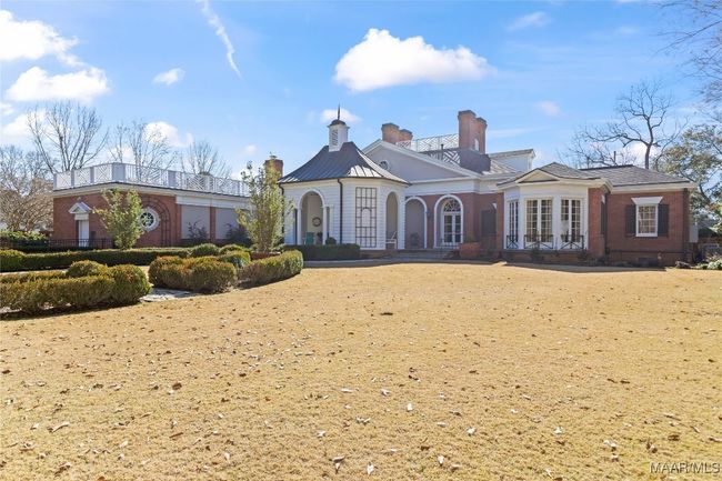 Back elevation and gorgeous lawn and landscaping | Image 44