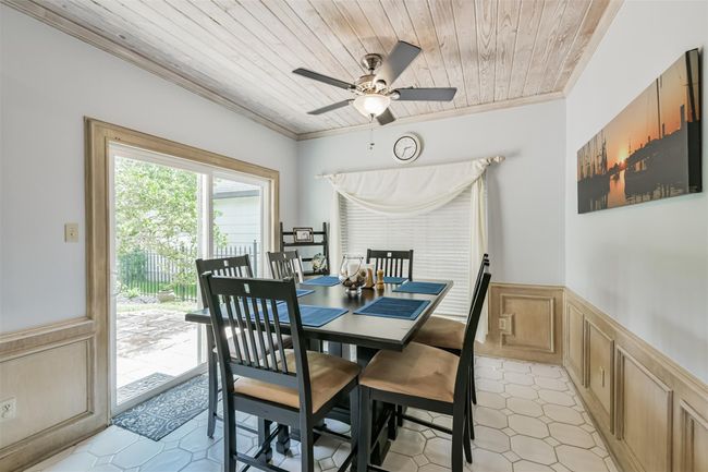 Another view of the bright and cheerful breakfast area. | Image 19