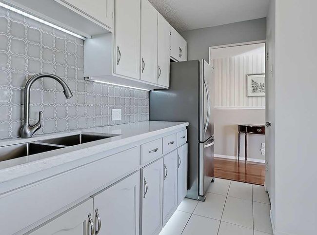 100 - 524 Cedar Crescent Sw, Condo with 2 bedrooms, 1 bathrooms and 1 parking in Calgary AB | Image 26